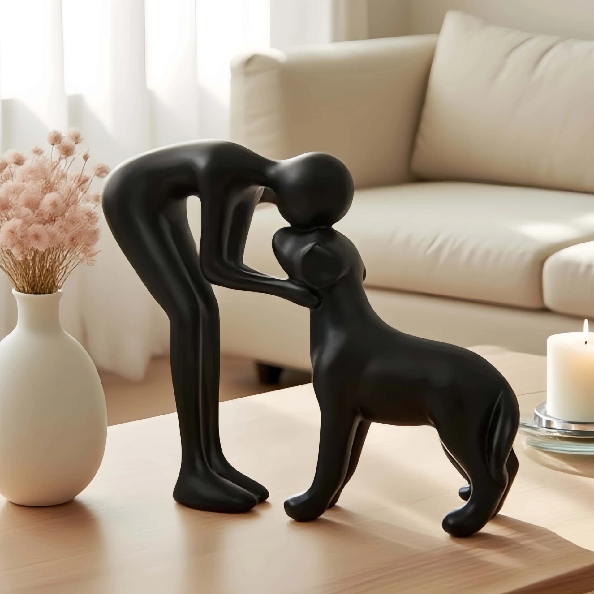 An elegant and simple black dog and owner statue, a warm gift for pet lovers and a home table decoration that is not easy to bre